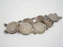 il_570xN.1506506098_sl2xcoin braclet.webp