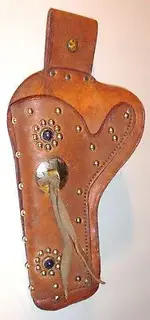 Vintage-Leather-Cap-Gun-Holster-with-Blue.webp