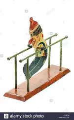 antique-parallel-bars-gymnast-toy-isolated-on-white-background-J1M80W.webp