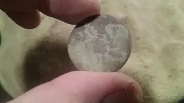 Possible coin one side.webp