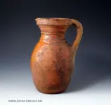 redware-earthenware-post-medieval-jug-with-bib-of-clear-glaze-english-16th-century.webp