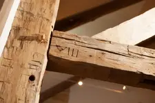 15-Timber-Frame-Barn-Original-Marriage-Marks-Roman-Numerals-Texas-Ranch-Architect-Steve-Chamb...webp
