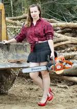 Katie Holding Chainsaw.webp