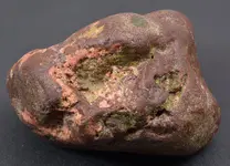 agate looking rock with orange fl3a.webp
