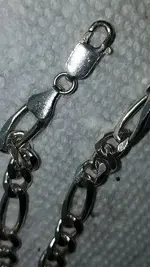 silver figaro chain.webp