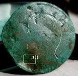 Eagle coin with head details.webp