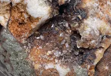 stained quartz with pyrite.webp