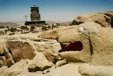 Mystery Rock Boulder Park Dog Sculpter.webp
