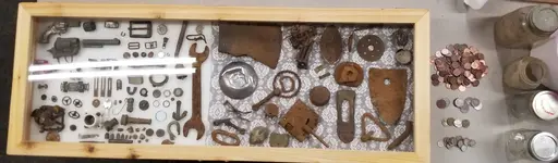 RELICS DISPLAY CLOSED WITH COINS.webp