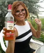 Woman_with_Appleton_Jamaica_Rum.webp