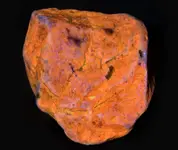 orange uv color carbonate rock3.webp