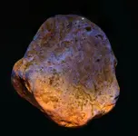 orange uv color carbonate rock.webp
