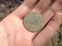 gwbuttonjustdug.webp