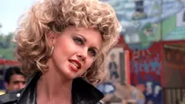 most-iconic-beauty-movie-moments-grease-sandy-920x518.webp