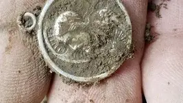 st carmel medal dirt 060219.webp