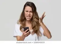 Msbeepbeep and her cell phone.webp