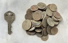Modern coins and key.webp