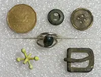 Ring, coin, buttons and buckle.webp