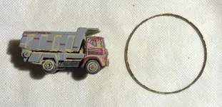 Dump truck and bracelet.webp