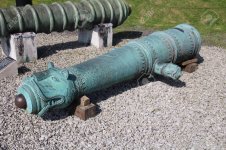 100329002-ornate-indian-cannon-decorated-with-a-tigers-head-made-of-bronze-this-24-pounder-was-c.jpg