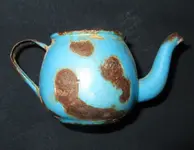 little porcelain teapot.webp