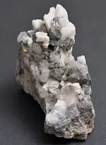 calcite quartz pyrite on limestone2.webp