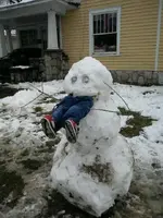 man eating snowman.webp