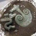 Ceremonial-axe-and-horse-figure.webp