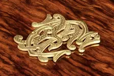 antique-applied-brass-monogram-700x469.webp