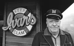 1978-Ivar-w-Fish-Bar-Sign.webp