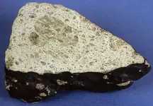 meteorite-section-fragment-achondrite-Johnstown-Colorado-orthopyroxene-July-6-1924.webp