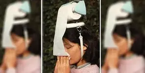 Head-Mounted-Toilet-Paper-Dispenser.webp