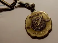 Geo_Conroy_1923-1924_St._Paul_AC_Medal_Front_large.webp