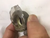 Brass with Glass thingy underside.webp