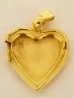 14k gold locket backhalf 2020.webp 14k gold locket backhalf 2020.webp