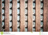 detail-wood-metal-door-rivets-old-solid-striped-metallic-looking-worn-grungy-part-ancient-cas...webp
