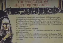 Petrifying Well Sign.webp