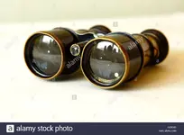 old-brass-and-steel-antique-vintage-binoculars-or-field-glasses-BJ9C4B.webp