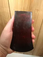 red paint axe head stamped E 001.webp