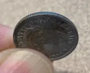 barber dime close up.webp