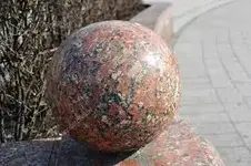red granite sphere.webp