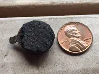 BACK OF CAP SEEMS TO BE RUBBER.webp