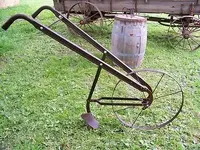 antique-steel-wheeled-garden-push_1_3489c6316eecfa4e8456ee90882069bf.webp