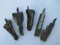lot-of-5-old-leather-iron-farm-corn-husking-pegs-tools-The-Boss-Laurel-Leaf-Farm-item-no-w914...webp