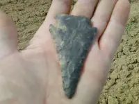 Arrowhead in hand.webp