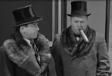 curly with cigar.webp