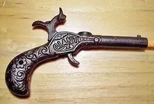 early-miniature-giant-cast-iron-toy.webp
