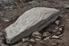The-ancient-capstone-which-was-discovered-last-week-at-the-Shiel-Hospital-site-in-Ballyshannon.webp