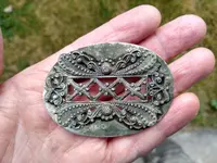 Broach in hand.webp Broach in hand.webp