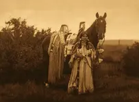 -Cayuse_girl_with-her-proudly-decked-horse.webp